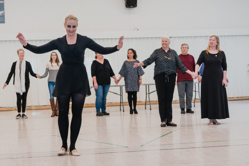 Exploring Nutcracker seminar attendees learning the Grandfather dance from Tomasson's Nutcracker