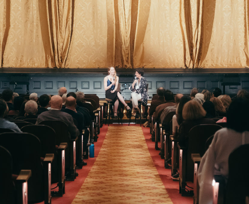 Jennifer Stahl being interviewed by Mary Wood during a pre-performance Meet the Artist talk