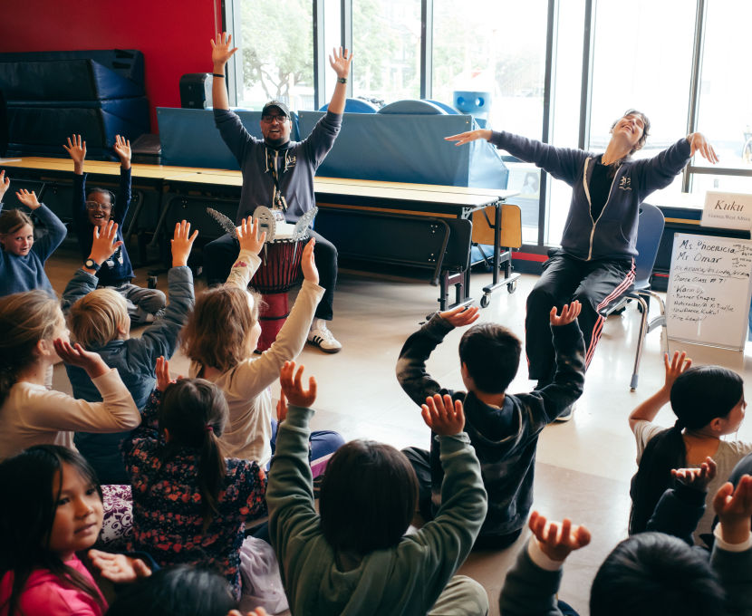 DISC Musician Omar Ledezma Jr. and Teaching Artist Phoenicia Pettyjohn with students at George Peabody Elementary School