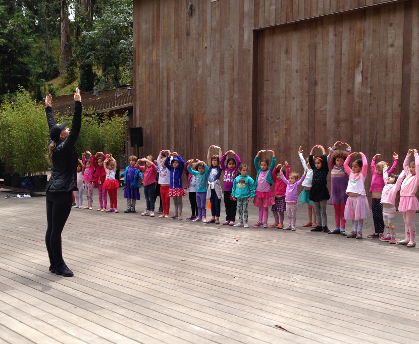 SF Ballet School Faculty member Kristi DeCaminada leading a dance workshop at the Stern Grove's Kids Days.